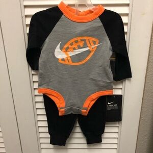 Nike Kids Black and Orange Football Bodysuit with black pants